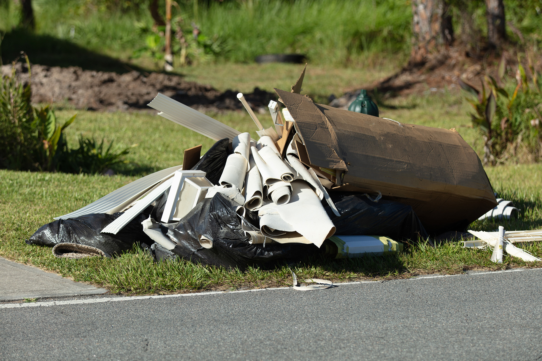 trash and discarded items placed at curbside can be unsightly to